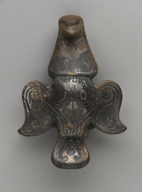  <em>Garment Hook in the Form of a Bird</em>, 475-221 B.C.E. Bronze, silver, Length: 2 1/2 x 1 7/8 in. (6.4 x 4.8 cm). Brooklyn Museum, Gift of Alan and Simone Hartman, 1991.127.7. Creative Commons-BY (Photo: Brooklyn Museum, 1991.127.7_PS4.jpg)