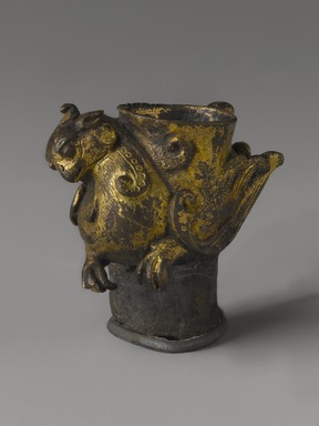  <em>Mount in the Form of a Phoenix</em>, 618-907. Gilt bronze, Length: 3 1/4 in. (8.3 cm). Brooklyn Museum, Gift of Alan and Simone Hartman, 1991.127.8. Creative Commons-BY (Photo: Brooklyn Museum, 1991.127.8_PS4.jpg)