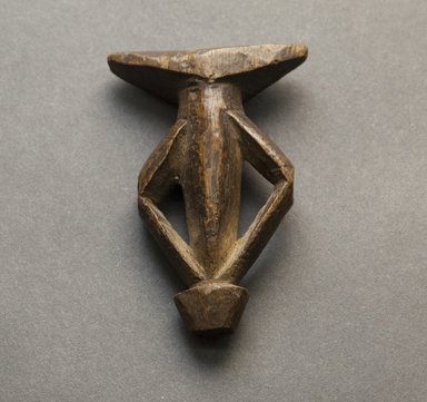 Possibly Mossi. <em>Whistle</em>, late 19th-early 20th century. Wood, 2 5/8 x 1 3/8 x 1/2 in. (6.7 x 3.5 x 1.3 cm). Brooklyn Museum, Gift of Eileen and Michael Cohen, 1991.227.10. Creative Commons-BY (Photo: Brooklyn Museum, 1991.227.10_front_PS10.jpg)
