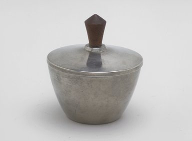 Marion Anderson Noyes (American, 1907-2002). <em>Sugar Bowl with Lid</em>, ca. 1933. Pewter, walnut, 3 3/4 x 3 3/4 x 3 3/4 in. (9.5 x 9.5 x 9.5 cm). Brooklyn Museum, Gift of Marion Anderson Noyes, 1991.258.4a-b. Creative Commons-BY (Photo: Brooklyn Museum, 1991.258.4a-b.jpg)