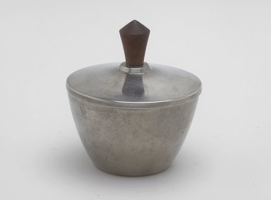 Marion Anderson Noyes (American, 1907–2002). <em>Sugar Bowl with Lid</em>, ca. 1933. Pewter, walnut, 3 3/4 x 3 3/4 x 3 3/4 in. (9.5 x 9.5 x 9.5 cm). Brooklyn Museum, Gift of Marion Anderson Noyes, 1991.258.4a-b. Creative Commons-BY (Photo: Brooklyn Museum, 1991.258.4a-b.jpg)