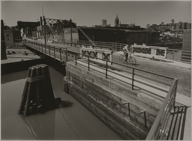 Tony Velez (American, born 1946). <em>Carroll Street Bridge (Over Gowanus Canal), 1 of 20 from a Portfolioof 34</em>, 1990. Gelatin silver print, 11 x 14in. (27.9 x 35.6cm). Brooklyn Museum, Gift of Victor H. Kempster, 1991.306.17. © artist or artist's estate (Photo: Brooklyn Museum, 1991.306.17_PS11.jpg)