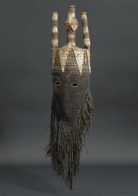 Salampasu. <em>Mask for the Idangani Society, Akish</em>, early 20th century. Cloth, pigment, wicker, fiber, 31 1/2 x 8 1/16 x 7 1/16 in. (80 x 20.4 x 18 cm). Brooklyn Museum, Gift of Corice and Armand P. Arman, 1992.133.1. Creative Commons-BY (Photo: Brooklyn Museum, 1992.133.1_SL1.jpg)