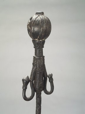 Gbi. <em>Staff</em>, 19th-20th century. Iron, brass, copper alloy, 43 x 3 in. (109.2 x 7.6 cm). Brooklyn Museum, Gift of Blake Robinson, 1992.26.9. Creative Commons-BY (Photo: Brooklyn Museum, 1992.26.9_detail_transpc001.jpg)