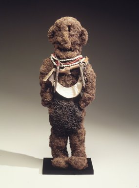  <em>Spirit Figure</em>, 20th century. Plant matter, teeth, glass beads, white seeds, cord, pig and opossum bones, shells, kina shell, woven net, 20 x 8 3/4 x 8 3/4 in. (50.8 x 22.2 x 22.2 cm). Brooklyn Museum, Gift of Mr. and Mrs. Alastair B. Martin, the Guennol Collection, 1992.73.1. Creative Commons-BY (Photo: Brooklyn Museum, 1992.73.1_transpc002.jpg)