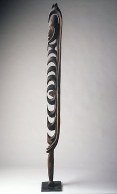 Yimam. <em>Hook Figure (Yipwon)</em>, 20th century. Wood, shell, 93 x 7 x 4 in. Brooklyn Museum, Gift of Alyce and Roger Rose, 1993.181.1. Creative Commons-BY (Photo: Brooklyn Museum, 1993.181.1_transpc004.jpg)