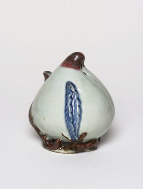  <em>Water Dropper in the Shape of a Peach</em>, last half of 18th century. Glazed porcelain with cobalt blue and copper red decoration, overall: 4 3/8 x 3 3/4 x 3 7/8 in. (11.1 x 9.5 x 9.8 cm). Brooklyn Museum, Gift of Robert S. Anderson, 1993.185.3. Creative Commons-BY (Photo: , 1993.185.3_PS11.jpg)