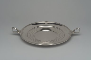 Alfred G. Kintz (American, 1885–1963). <em>Plate, Ebbtide</em>, ca. 1928. Silver, 1 3/4 x 13 3/16 x 10 1/16in. (4.4 x 33.5 x 25.6cm). Brooklyn Museum, Gift of Daniel Morris and Denis Gallion, 1993.208.2. Creative Commons-BY (Photo: Brooklyn Museum, 1993.208.2.jpg)