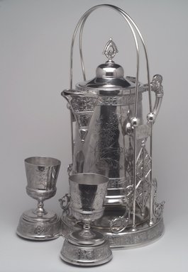 Pairpoint Manufacturing Company (1880–1929). <em>Pitcher on Stand</em>, ca. 1885. Silverplate, Pitcher: 13 x 10 15/16 x 7 3/4 in. (33 x 27.8 x 19.7 cm). Brooklyn Museum, Gift of Paul F. Walter, 1994.119.2a-c. Creative Commons-BY (Photo: , 1994.119.2a-c_1994.119.3_1994.119.4.jpg)