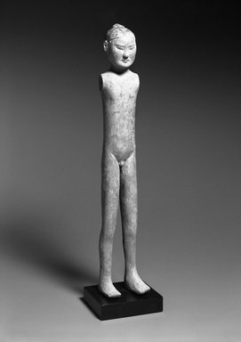  <em>Tomb Figure of an Attendant</em>, 206 B.C.E.-220 C.E. Earthenware, polychrome, 24 3/4 × 3 5/8 in. (62.9 × 9.2 cm). Brooklyn Museum, Gift of Thomas Colville, 1994.147. Creative Commons-BY (Photo: Brooklyn Museum, 1994.147_bw.jpg)