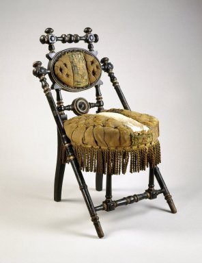 George Jacob Hunzinger (American, born Germany, 1835–1898). <em>Chair</em>, ca. 1869. Ebonized wood, original upholstery, 33 1/2 x 19 3/4 x 22 5/8 in.  (85.1 x 50.2 x 57.5 cm). Brooklyn Museum, Gift of Norman Mizuno, 1994.164. Creative Commons-BY (Photo: Brooklyn Museum, 1994.164_view1_IMLS_SL2.jpg)