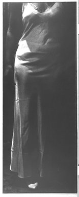 Susan Daboll (American, born 1952). <em>Mother's Closet #3</em>, 1989. Gelatin silver photograph, image/sheet: 58 1/4 x 22 1/2 in. (148 x 57.2 cm). Brooklyn Museum, Purchased with funds given by the Horace W. Goldsmith Foundation, Harry Kahn, and Mrs. Carl L. Selden, 1994.32. © artist or artist's estate (Photo: Brooklyn Museum, 1994.32_bw.jpg)