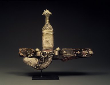  <em>Dagger with Sheath and Belt</em>, 19th century. Steel, buffalo horn covered with granulated and repousse sheet silver, leather and cotton brocaded with metal thread, dagger, length: 12 in. Brooklyn Museum, Purchased with funds given by Mrs. Carl L. Selden and Dr. Bertram H. Schaffner, 1994.8a-b. Creative Commons-BY (Photo: Brooklyn Museum, 1994.8a-b.jpg)
