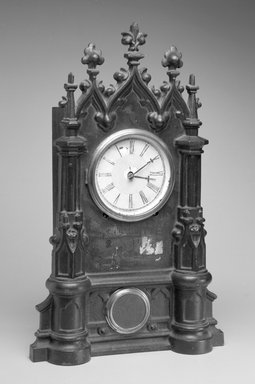 C. Chinnocks. <em>Clock and Key</em>, ca. 1845-1865. Cast iron, wood, gilt metal and glass, 20.25 x 12.5 x 4.75 in.  (51.4 x 31.8 x 12.1 cm). Brooklyn Museum, Gift of David A. Hanks in memory of Henry P. McIlhenny, 1995.105a-b. Creative Commons-BY (Photo: Brooklyn Museum, 1995.105a-b_bw.jpg)