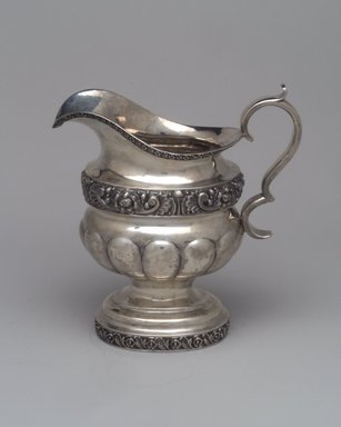 Unknown. <em>Creamer, Part of Three-Piece Set</em>, 1826-1828. Silver, 7 7/16 × 3 3/4 × 7 1/2 in. (18.9 × 9.5 × 19.1 cm). Brooklyn Museum, Gift of Marcelle H. Littell, 1995.151.2. Creative Commons-BY (Photo: Brooklyn Museum, 1995.151.2.jpg)