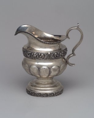 Unknown. <em>Creamer, Part of Three-Piece Set</em>, 1826–1828. Silver, 7 7/16 × 3 3/4 × 7 1/2 in. (18.9 × 9.5 × 19.1 cm). Brooklyn Museum, Gift of Marcelle H. Littell, 1995.151.2. Creative Commons-BY (Photo: Brooklyn Museum, 1995.151.2.jpg)