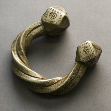 Tuareg. <em>Bracelet</em>, 20th century. Metal (copper-nickel alloy?), 3 3/4 × 3 1/2 × 1 1/2 in. (9.5 × 8.9 × 3.8 cm). Brooklyn Museum, Gift of Drs. John I. and Nicole Dintenfass, 1995.172.2. Creative Commons-BY (Photo: Brooklyn Museum, 1995.172.2_front_PS10.jpg)