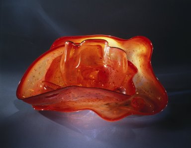 Dale Chihuly (American, born 1941). <em>Cadmium Red Basket Set with Plumbeous Black Lip Wrap</em>, Designed and made 1993. Glass, 19 × 37 × 21 in. (48.3 × 94.0 × 53.3 cm). Brooklyn Museum, Gift of Charles Cowles and Dale Chihuly, 1995.60a-k. Creative Commons-BY (Photo: Brooklyn Museum, 1995.60a-k_SL1.jpg)