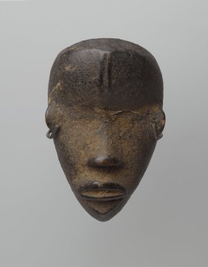 Dan. <em>Personal Miniature Mask (Ma Go)</em>, 19th or 20th century. Wood, organic matter, fiber or feathers, 4 3/4 x 3 x 2in. (12.1 x 7.6 x 5.1cm). Brooklyn Museum, Gift of Blake Robinson, 1995.7.28. Creative Commons-BY (Photo: Brooklyn Museum, 1995.7.28_front_PS6.jpg)