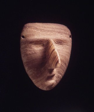 <em>Mask</em>, ca. 300-100 B.C.E. Stone, 4 1/2 x 4 1/4 x 3 in. Brooklyn Museum, Bequest of Mrs. Carl L. Selden, 1996.116.19. Creative Commons-BY (Photo: Brooklyn Museum, 1996.116.19_transpc005.jpg)