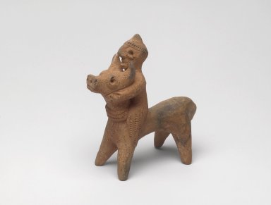 Syro-Hittite. <em>Statuette of Bull and Rider</em>, first half of 2nd millennium B.C.E. Clay, 8.9 x 3.1 x 7.9 cm. Brooklyn Museum, Bequest of Mrs. Carl L. Selden, 1996.146.7. Creative Commons-BY (Photo: Brooklyn Museum, 1996.146.7_threequarter.jpg)