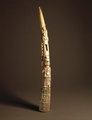 Edo. <em>Side-Blown Horn with Figurative Base (Oko)</em>, 18th or 19th century. Ivory, copper alloy, 15 x 3 1/2 x 7in. (38.1 x 8.9 x 17.8cm). Brooklyn Museum, Gift of Beatrice Riese, 1996.171a-b. Creative Commons-BY (Photo: Brooklyn Museum, 1996.171a_SL1.jpg)