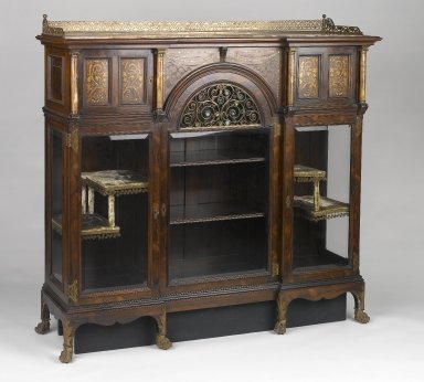 Herts Brothers. <em>Cabinet</em>, ca. 1885. Faux-grained Rosewood, other woods, glass, alabaster, brass, mother-of-pearl, other metals, original velvet textile and trim on interior, 54 3/4 x 58 7/8 x 17 1/4 in. (139.1 x 149.5 x 43.8 cm). Brooklyn Museum, Gift of David Whitcomb, 1996.218. Creative Commons-BY (Photo: Brooklyn Museum, 1996.218_threequarter_PS1.jpg)