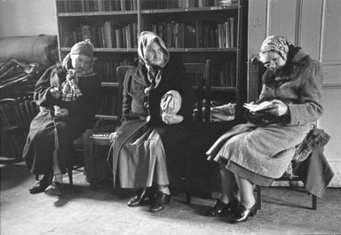 Vivian Cherry (American, 1920-2019). <em>Catholic Workers (Three Women Seated in the Headquaters on Newspaper)</em>, 1955. Gelatin silver photograph (vintage), 6 7/8 x 10 in. (17.5 x 25.3 cm). Brooklyn Museum, Gift of Steven Schmidt, 1996.241.10. © artist or artist's estate (Photo: Brooklyn Museum, 1996.241.10_bw.jpg)