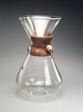Peter Schlumbohm (American, born Germany, 1896-1962). <em>Coffee Maker</em>, Designed 1941. Glass, wood, leather, 11 3/8 x 6 7/8 x 6 7/8 in. (28.9 x 17.5 x 17.5 cm). Brooklyn Museum, Gift of Dr. Barry R. Harwood, 1997.117. Creative Commons-BY (Photo: Brooklyn Museum, 1997.117_transp5213.jpg)