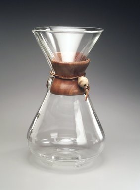 Peter Schlumbohm (American, born Germany, 1896–1962). <em>Coffee Maker</em>, Designed 1941. Glass, wood, leather, 11 3/8 x 6 7/8 x 6 7/8 in. (28.9 x 17.5 x 17.5 cm). Brooklyn Museum, Gift of Dr. Barry R. Harwood, 1997.117. Creative Commons-BY (Photo: Brooklyn Museum, 1997.117_transp5213.jpg)