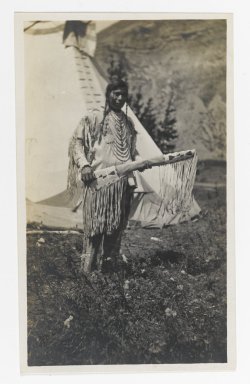 Unknown. <em>[Untitled] (Native American Chief Standing in front of Teepee)</em>, ca. 1900. Gelatin silver print, 5 1/4 x 3 1/8 in. (13.3 x 8.0 cm). Brooklyn Museum, Gift of Sasha Nyary and Family, 1997.163.17 (Photo: Brooklyn Museum, 1997.163.17_PS2.jpg)