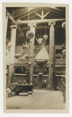 Unknown. <em>[Untitled] (Exhibition Hall with a Bear Skin and Native American Artifacts)</em>, ca. 1900. Gelatin silver print, 2 5/8 x 3 7/8 in. (6.6 x 9.8 cm). Brooklyn Museum, Gift of Sasha Nyary and Family, 1997.163.19 (Photo: Brooklyn Museum, 1997.163.19_PS2.jpg)