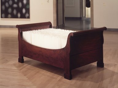 Donald Lipski (born 1946). <em>Untitled (C-23)</em>, 1991. Candles, wooden bed, 81 1/2 x 44 1/2 x 38 in. Brooklyn Museum, Gift of Terri Hyland, 1997.192. © artist or artist's estate (Photo: Brooklyn Museum, 1997.192_transpc002.jpg)