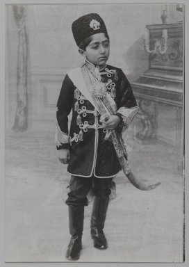  <em>Portrait of Ahmad Shah as a Young Boy, One of 274 Vintage Photographs</em>, ca. 1890 or 1900-1905. Gelatin silver photograph, 6 1/2 x 4 9/16 in.  (16.5 x 11.6 cm). Brooklyn Museum, Purchase gift of Leona Soudavar in memory of Ahmad Soudavar, 1997.3.101 (Photo: Brooklyn Museum, 1997.3.101_PS2.jpg)