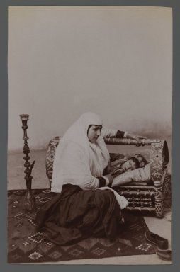  <em>Woman Rocking her Child's Cradle,  One of 274 Vintage Photographs</em>, late 19th-early 20th century. Albumen silver photograph, 8 3/16 x 5 1/4 in.  (20.8 x 13.3 cm). Brooklyn Museum, Purchase gift of Leona Soudavar in memory of Ahmad Soudavar, 1997.3.15 (Photo: Brooklyn Museum, 1997.3.15_IMLS_PS3.jpg)