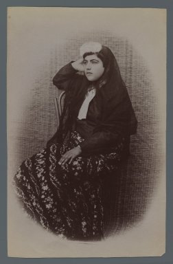  <em>Studio Shot of Woman Seated Against a Woven Wicker Backdrop , One of 274 Vintage Photographs</em>, late 19th–early 20th century. Albumen silver photograph, 8 3/16 x 5 3/16 in.  (20.8 x 13.2 cm). Brooklyn Museum, Purchase gift of Leona Soudavar in memory of Ahmad Soudavar, 1997.3.20 (Photo: Brooklyn Museum, 1997.3.20_IMLS_PS3.jpg)