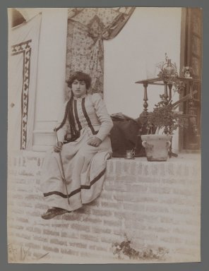  <em>Woman in European Costume Seated on a Veranda Holding a Violin Bow, One of 274 Vintage Photographs</em>, late 19th–early 20th century. Albumen silver photograph, 8 1/16 x 6 1/4 in.  (20.5 x 15.8 cm). Brooklyn Museum, Purchase gift of Leona Soudavar in memory of Ahmad Soudavar, 1997.3.25 (Photo: Brooklyn Museum, 1997.3.25_IMLS_PS3.jpg)