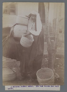  <em>Woman Carrying Baskets with Veil Thrown Aside, One of 274 Vintage Photographs</em>, late 19th-early 20th century. Albumen silver photograph, 8 3/16 x 6 3/16 in.  (20.8 x 15.7 cm). Brooklyn Museum, Purchase gift of Leona Soudavar in memory of Ahmad Soudavar, 1997.3.28 (Photo: Brooklyn Museum, 1997.3.28_IMLS_PS3.jpg)