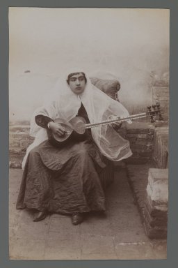  <em>Woman Seated Playing 6-string Persian Lute, One of 274 Vintage Photographs</em>, late 19th–early 20th century. Albumen silver photograph, 8 3/16 x 5 1/4 in.  (20.8 x 13.3 cm). Brooklyn Museum, Purchase gift of Leona Soudavar in memory of Ahmad Soudavar, 1997.3.30 (Photo: Brooklyn Museum, 1997.3.30_IMLS_PS3.jpg)