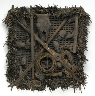 Ejagham. <em>Emblem (Nkpa) of the Leopard Spirit Society</em>, 19th century. Wood, animal skulls, plant fiber, iron, pigment, 37 x 36 x 9 in.  (94.0 x 91.4 x 22.9 cm). Brooklyn Museum, Frank L. Babbott Fund, 1998.123. Creative Commons-BY (Photo: Brooklyn Museum, 1998.123_PS2.jpg)