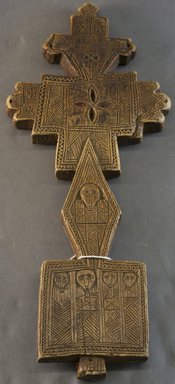 Amhara. <em>Hand Cross (mäsqäl)</em>, late 18th or early 19th century. Wood, fiber, 14 1/4 x 6 x 1 in.  (36.2 x 15.2 x 3.2 cm). Brooklyn Museum, Gift of Eric Goode, 1998.173.2. Creative Commons-BY (Photo: Brooklyn Museum, 1998.173.2_PS10.jpg)