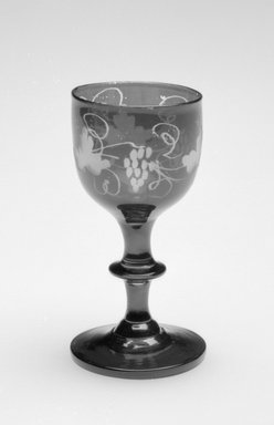  <em>Footed Glass</em>, ca. 19th century. Glass, 3 5/8 x 1 7/8 x 1 7/8 in. (9.2 x 4.7 x 4.7 cm). Brooklyn Museum, Gift of Hattie Forgang, 1998.92.6. Creative Commons-BY (Photo: Brooklyn Museum, 1998.92.6_view1_bw.jpg)