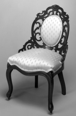 John Henry Belter (American, born Germany, 1804-1863). <em>Chair</em>, ca. 1840-1850. Laminated wood with upholstered seats Brooklyn Museum, Bequest of Miriam Godofsky, 1999.105.2. Creative Commons-BY (Photo: Brooklyn Museum, 1999.105.2_bw_IMLS.jpg)