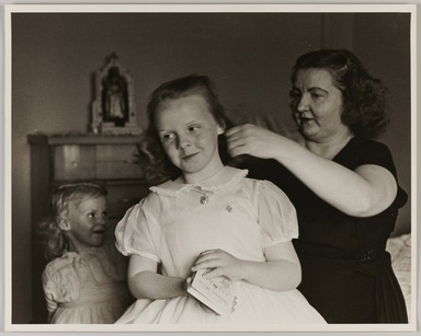 Larry Fink (American, born 1941). <em>Confirmation Day (Mother and Two Daughters)</em>, ca. early 1960s. Gelatin silver print, image: 15 1/8 x 19 3/8 in. (38.4 x 49.2 cm). Brooklyn Museum, Gift of Joan Snyder, 1999.128.1. © artist or artist's estate (Photo: Brooklyn Museum, 1999.128.1_PS20.jpg)