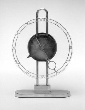 American. <em>Clock</em>, ca. 1935. Metal, glass, 10 x 6 1/4 x 2 1/8 in.  (25.4 x 15.9 x 5.4 cm). Brooklyn Museum, Gift of Paul F. Walter, 1999.141.6. Creative Commons-BY (Photo: Brooklyn Museum, 1999.141.6_bw.jpg)