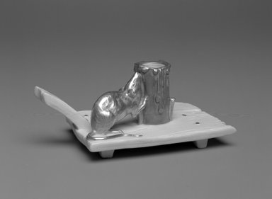 Worcester Royal Porcelain Co. (founded 1751). <em>Mouse Taper</em>, introduced 1887, made 1902. Porcelain, glaze, gilding, Overall: 2 3/4 × 3 1/2 × 6 1/8 in. (7 × 8.9 × 15.6 cm). Brooklyn Museum, Gift of the Estate of Harold S. Keller, 1999.152.96. Creative Commons-BY (Photo: Brooklyn Museum, 1999.152.96_view2_bw.jpg)