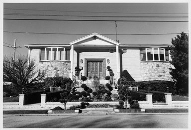 Edward Grazda (American, born 1947). <em>House at Royce Avenue and Avenue V, Bergen Beach, Brooklyn</em>, 1997. Gelatin silver print, image: 15 1/2 x 22 3/4 in. (39.4 x 57.8 cm). Brooklyn Museum, Robert A. Levinson Fund, 1999.64.1. © artist or artist's estate (Photo: Brooklyn Museum, 1999.64.1_bw.jpg)