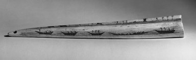 Alaska Native. <em>Engraved Tusk</em>, late 19th century. Walrus tusk, black ash or graphite, oil, 14 13/16 x 2 5/16 in. (37.6 x 5.9 cm). Brooklyn Museum, Gift of Robert B. Woodward, 20.894. Creative Commons-BY (Photo: Brooklyn Museum, 20.894_acetate_bw.jpg)