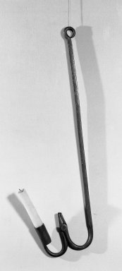  <em>Hanging Rush Light Holder</em>, 17th century. Hand wrought iron, 18 x 4 1/2 in. (45.7 x 11.4 cm). Brooklyn Museum, 20.898. Creative Commons-BY (Photo: Brooklyn Museum, 20.898_acetate_bw.jpg)
