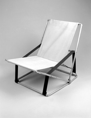 Henry (Heintz) P. Glass (American, born Austria, 1911–2003). <em>Folding Chair</em>, Designed 1961. Aluminum, canvas, synthetic webbing, 28 7/8 x 23 1/2 x 31 7/8 in. (73.3 x 59.7 x 81 cm). Brooklyn Museum, Modernism Benefit Fund, 2000.101.2. Creative Commons-BY (Photo: Brooklyn Museum, 2000.101.2_bw.jpg)